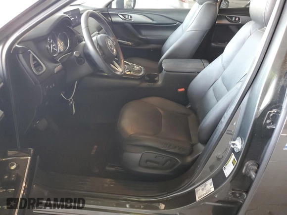 2021 Mazda CX-9 Touring z VIN JM3TCACYXM0520912, wystawiony jako Copart lot #60726695 z przebiegiem 36 506 mil mil oraz Szkoda całkowita • Salvage title. Historia ofert i sprzedaży dostępna na DreamBid. Obrazek 7.