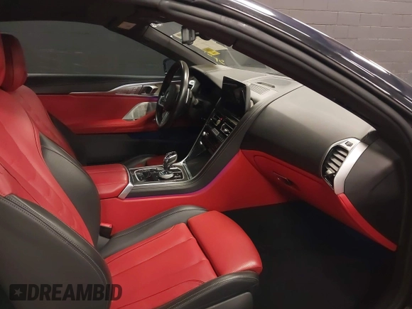 2023 BMW 8 Series with VIN WBAFY4C01PCM52812, listed as a IAAI auction lot 41967777 with 12,490 mi miles and . Bid and sale history available at DreamBid. Image 5.