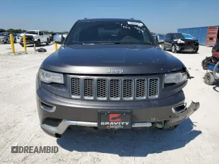 2014 Jeep Grand Cherokee Summit with VIN 1C4RJFJGXEC159438, listed as a Copart auction lot 50864595 with 134,558 mi miles and Salvage title. Bid and sale history available at DreamBid. Image 5.