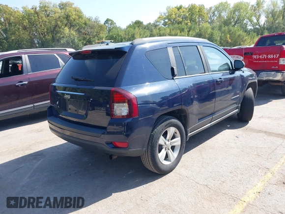 2014 Jeep Compass Sport with VIN 1C4NJCBB0ED660610, listed as a IAAI auction lot 40506737 with 209,670 mi miles. Bid and sale history available at carsss.com. Image 4.