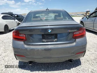 2015 BMW 2 Series M235i with VIN WBA1J7C55FV253647, listed as a Copart auction lot 60231395 with 57,639 mi miles and Salvage title. Bid and sale history available at DreamBid. Image 6.