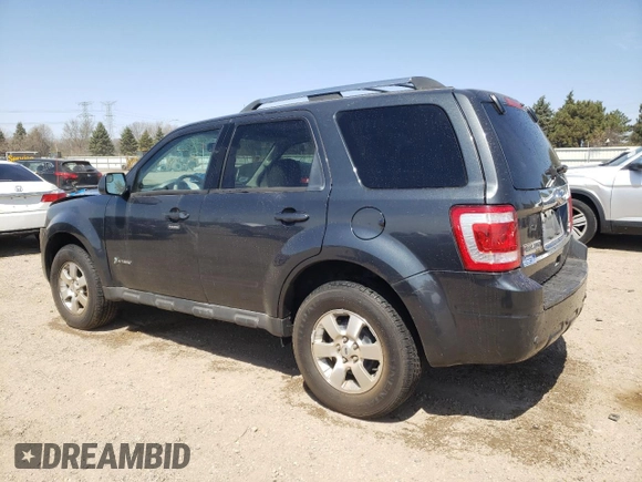 2010 Ford Escape Hybrid z VIN 1FMCU4K32AKB79563, wystawiony jako Copart lot #52892885 z przebiegiem 177 008 mil mil oraz Szkoda całkowita • Salvage title. Historia ofert i sprzedaży dostępna na DreamBid. Obrazek 2.
