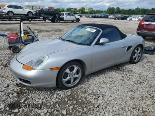 2001 Porsche Boxster с VIN WP0CA29841U624666, выставлен на аукционе Copart как лот 61750965 с пробегом 77 595 миль миль и Чистый • Clean title. История ставок и продаж доступна на DreamBid. Изображение 1.