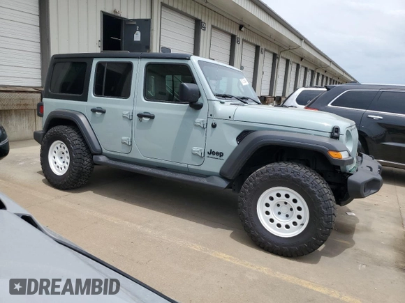 2023 Jeep Wrangler Sport with VIN 1C4HJXDN0PW643485, listed as a Copart auction lot 59783564 with 14,001 mi miles and Salvage Title. Bid and sale history available at DreamBid. Image 4.