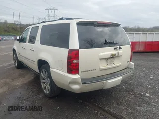 2010 Chevrolet Suburban LTZ with VIN 1GNUKKE35AR129351, listed as a IAAI auction lot 41971625 with 234,487 mi miles. Bid and sale history available at carsss.com. Image 6.