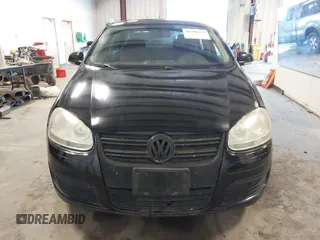 2008 Volkswagen Jetta Sedan S with VIN 3VWJM71K78M153658, listed as a IAAI auction lot 41709377 with 144,467 mi miles. Bid and sale history available at carsss.com. Image 12.