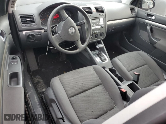 2009 Volkswagen Rabbit S with VIN WVWBB71K89W037593, listed as a Copart auction lot 74941614 with 51,645 mi miles and Salvage title. Bid and sale history available at DreamBid. Image 8.
