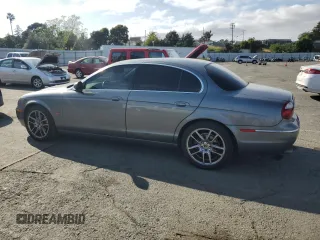 2005 Jaguar S-Type with VIN SAJWA01T15FN13800, listed as a Copart auction lot 53576305 with 182,533 mi miles and Salvage Title. Bid and sale history available at DreamBid. Image 2.