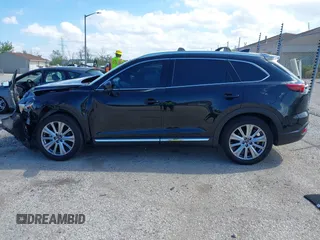 2021 Mazda CX-9 Signature with VIN JM3TCBEY1M0539786, listed as a IAAI auction lot 42264611 with 51,168 mi miles and . Bid and sale history available at DreamBid. Image 14.