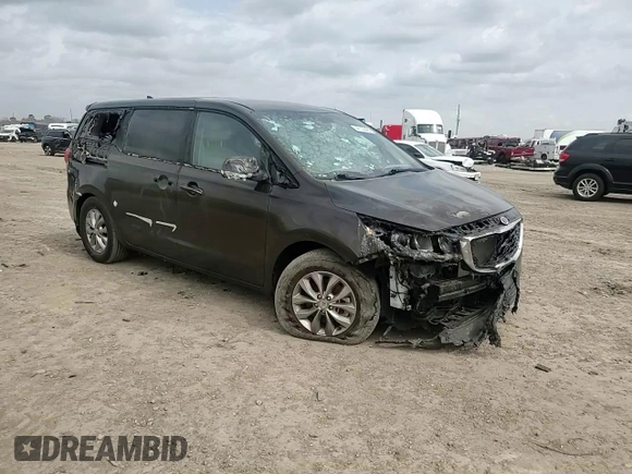 2021 Kia Sedona LX with VIN KNDMB5C17M6665266, listed as a Copart auction lot 48129495 with 57,274 mi miles and Salvage Title. Bid and sale history available at carsss.com. Image 12.