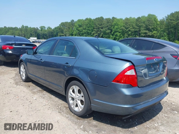 2012 Ford Fusion SE z VIN 3FAHP0HA4CR209490, wystawiony jako IAAI lot #42376506 z przebiegiem 145 622 mil mil oraz . Historia ofert i sprzedaży dostępna na DreamBid. Obrazek 3.