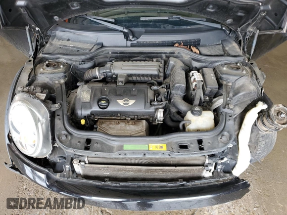 2011 MINI Hardtop with VIN WMWSU3C59BT099759, listed as a Copart auction lot 53995355 with 141,575 mi miles and Salvage Title. Bid and sale history available at DreamBid. Image 11.