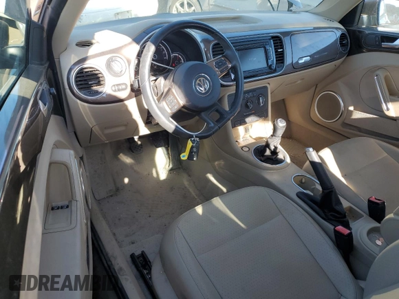 2015 Volkswagen Beetle with VIN 3VWH17AT3FM604193, listed as a Copart auction lot 72023304 with 49,958 mi miles and Salvage Title. Bid and sale history available at DreamBid. Image 8.