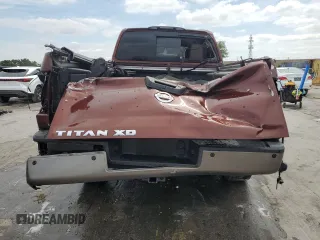2016 Nissan Titan Platinum Reserve z VIN 1N6BA1F28GN506397, wystawiony jako Copart lot #53831235 z przebiegiem 258 474 mil mil oraz Nie do naprawy • Non repairable. Historia ofert i sprzedaży dostępna na DreamBid. Obrazek 6.