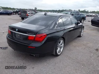 2014 BMW 7 Series 740Li with VIN WBAYE4C51ED138744, listed as a IAAI auction lot 42254213 with 116,157 mi miles and . Bid and sale history available at DreamBid. Image 4.