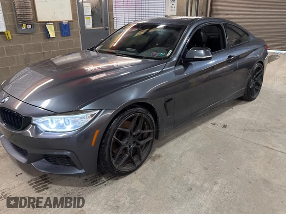 2014 BMW 4 Series 428i xDrive with VIN WBA3N5C56EF716258, listed as a Copart auction lot 52916185 with 106,512 mi miles and Salvage Title. Bid and sale history available at DreamBid. Image 2.