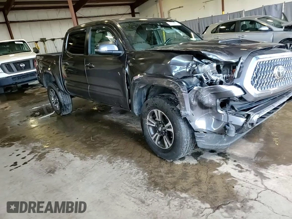 2019 Toyota Tacoma SR z VIN 3TMCZ5AN8KM197011, wystawiony jako Copart lot #56198675 z przebiegiem 117 363 mil mil oraz Szkoda całkowita • Salvage title. Historia ofert i sprzedaży dostępna na DreamBid. Obrazek 14.