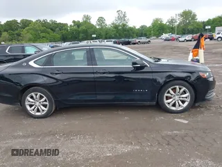 2017 Chevrolet Impala LT with VIN 1G1105S30HU191411, listed as a IAAI auction lot 42391385 with 196,115 mi miles and . Bid and sale history available at DreamBid. Image 13.