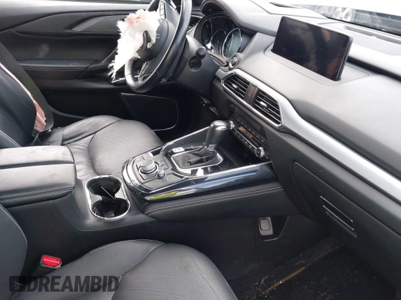 2021 Mazda CX-9 Grand Touring with VIN JM3TCBDY3M0537975, listed as a IAAI auction lot 42251894 with 50,156 mi miles and . Bid and sale history available at DreamBid. Image 5.