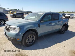 2023 Ford Maverick XL z VIN 3FTTW8E34PRA36653, wystawiony jako Copart lot #52192715 z przebiegiem 13 586 mil mil oraz Szkody całkowita. Historia ofert i sprzedaży dostępna na DreamBid. Obrazek 1.
