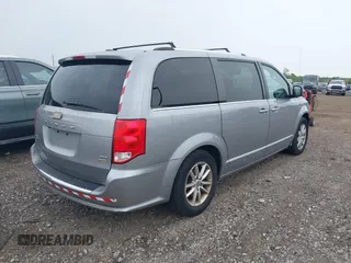 2018 Dodge Grand Caravan SXT z VIN 2C4RDGCG7JR301434, wystawiony jako IAAI lot #42510771 z przebiegiem 270 524 mil mil oraz . Historia ofert i sprzedaży dostępna na DreamBid. Obrazek 4.