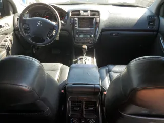 2006 Acura MDX Touring w/Navi with VIN 2HNYD18836H510543, listed as a Copart auction lot 71275524 with 153,416 mi miles and Salvage Title. Bid and sale history available at carsss.com. Image 8.