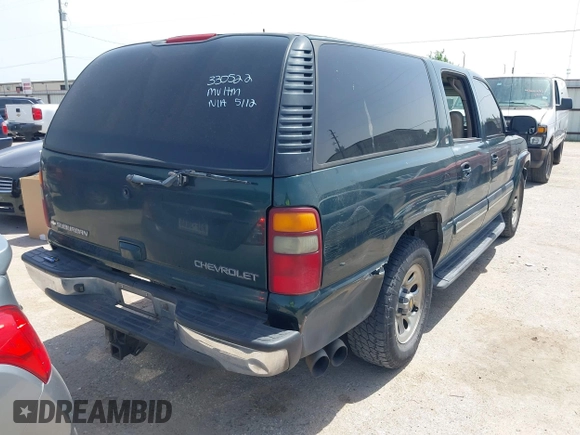 2002 Chevrolet Suburban LT with VIN 1GNEC16Z52J330522, listed as a IAAI auction lot 42251636 with 292,936 mi miles and . Bid and sale history available at DreamBid. Image 4.