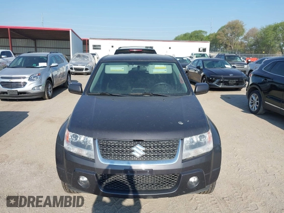 2012 Suzuki Grand Vitara Premium z VIN JS3TD0D22C4101455, wystawiony jako IAAI lot #42211776 z przebiegiem 153 569 mil mil oraz . Historia ofert i sprzedaży dostępna na DreamBid. Obrazek 6.