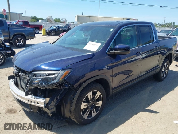 2020 Honda Ridgeline RTL with VIN 5FPYK3F56LB028917, listed as a IAAI auction lot 42280770 with 17,598 mi miles and . Bid and sale history available at DreamBid. Image 17.
