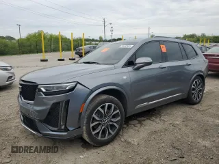 2021 Cadillac XT6 AWD Sport z VIN 1GYKPHRS9MZ165189, wystawiony jako Copart lot #58482665 z przebiegiem Nie podano mil oraz Szkoda całkowita • Salvage title. Historia ofert i sprzedaży dostępna na DreamBid. Obrazek 1.