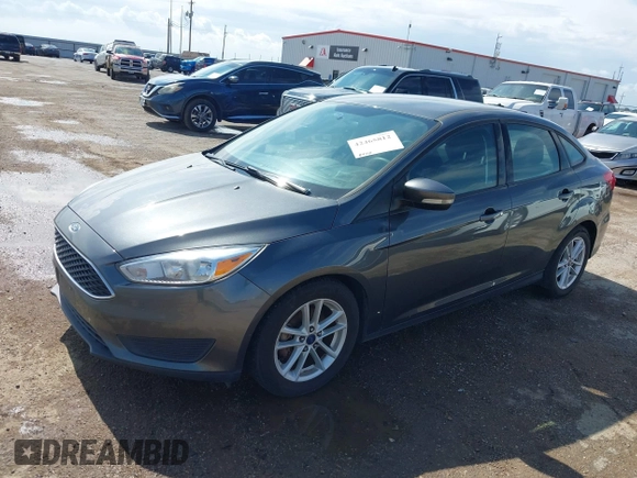 2017 Ford Focus SE z VIN 1FADP3F22HL235085, wystawiony jako IAAI lot #42465812 z przebiegiem 84 419 mil mil oraz . Historia ofert i sprzedaży dostępna na DreamBid. Obrazek 2.