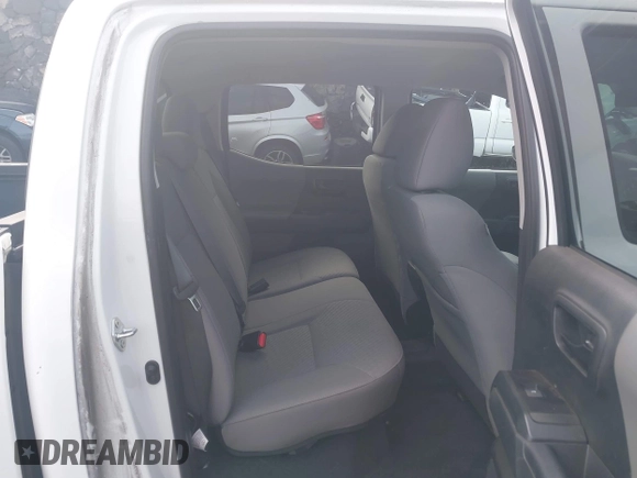 2023 Toyota Tacoma SR with VIN 3TYCZ5AN4PT168312, listed as a IAAI auction lot 42555775 with 8,288 mi miles and . Bid and sale history available at DreamBid. Image 8.