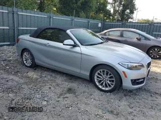 2016 BMW 2 Series 228i with VIN WBA1K9C52GV321963, listed as a Copart auction lot 71393424 with 118,029 mi miles and Salvage Title. Bid and sale history available at carsss.com. Image 4.