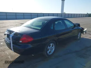 2002 Ford Taurus SE Standard with VIN 1FAFP53U72G132285, listed as a IAAI auction lot 41965332 with 214,966 mi miles and . Bid and sale history available at DreamBid. Image 4.