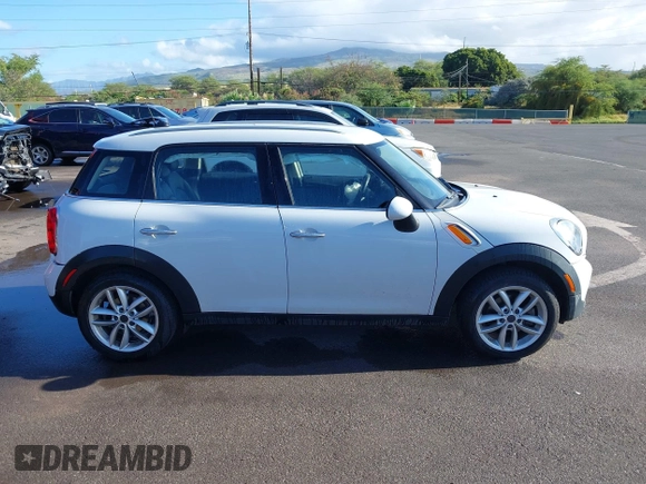2013 MINI Countryman with VIN WMWZB3C52DWR35806, listed as a IAAI auction lot 42184010 with 93,380 mi miles and . Bid and sale history available at DreamBid. Image 13.