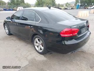 2012 Volkswagen Passat SE with VIN 1VWBP7A30CC026507, listed as a IAAI auction lot 42042850 with 202,406 mi miles. Bid and sale history available at carsss.com. Image 3.