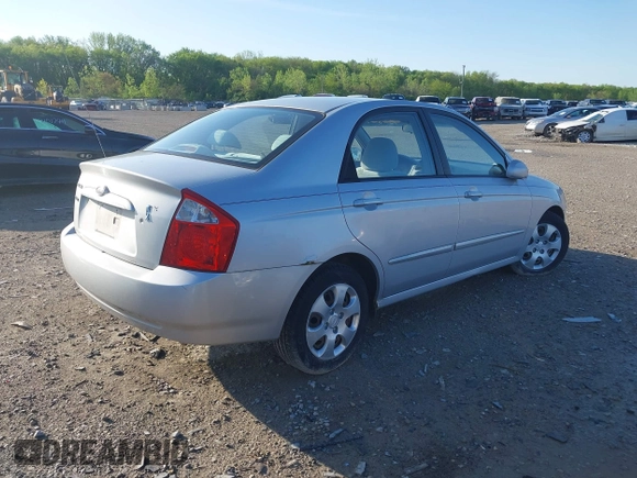 2006 Kia Spectra EX with VIN KNAFE121265312420, listed as a IAAI auction lot 42085732 with 59,641 mi miles. Bid and sale history available at carsss.com. Image 4.