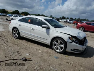 2013 Volkswagen CC Sport with VIN WVWBN7AN7DE522906, listed as a Copart auction lot 76385704 with 101,063 mi miles and Salvage Title. Bid and sale history available at DreamBid. Image 4.