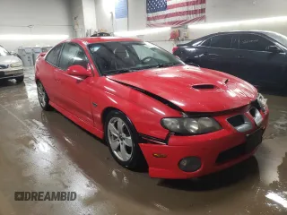 2004 Pontiac GTO with VIN 6G2VX12G74L288788, listed as a Copart auction lot 82424544 with 212,085 mi miles and Salvage Title. Bid and sale history available at carsss.com. Image 4.