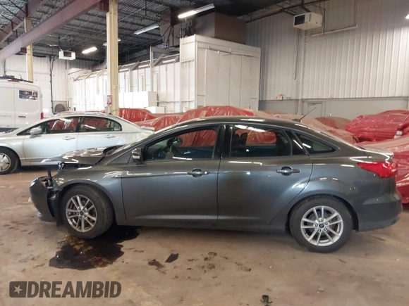 2015 Ford Focus SE with VIN 1FADP3F2XFL201554, listed as a IAAI auction lot 41817418 with 101,938 mi miles. Bid and sale history available at carsss.com. Image 15.