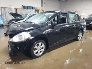 2011 Nissan Versa S with VIN 3N1BC1AP7BL410790, listed as a Copart auction lot 83893614 with 151,077 mi miles and Salvage title. Bid and sale history available at DreamBid. Image 1.