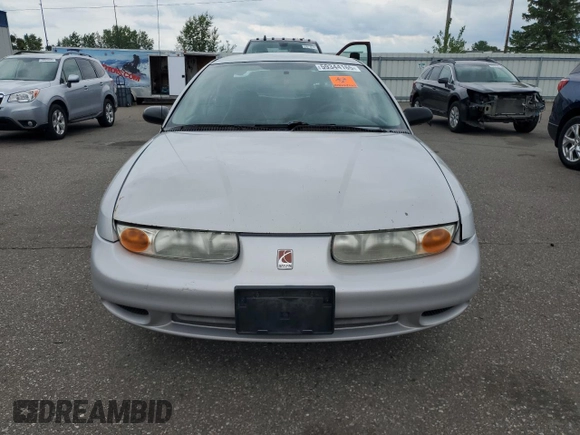 2000 Saturn SL с VIN 1G8ZG5284YZ152285, выставлен на аукционе Copart как лот 59344165 с пробегом Не указан миль и Списание • Salvage title. История ставок и продаж доступна на DreamBid. Изображение 5.