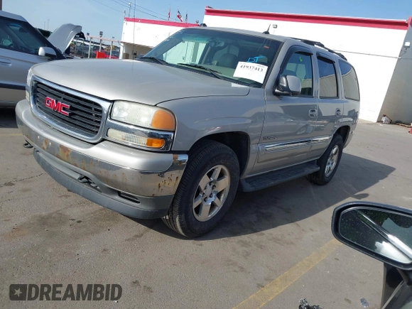 2005 GMC Yukon SLT with VIN 1GKEK13T15J118270, listed as a IAAI auction lot 41937413 with 218,057 mi miles. Bid and sale history available at carsss.com. Image 2.