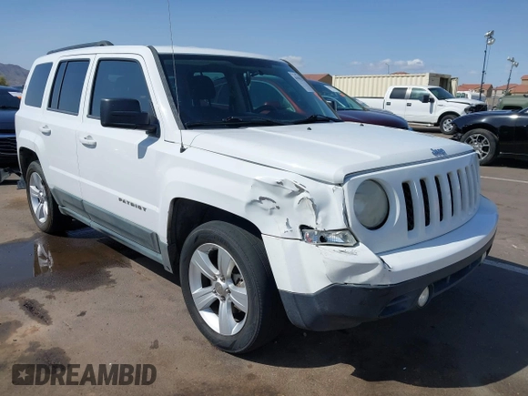 2011 Jeep Patriot Latitude with VIN 1J4NT1GB5BD245263, listed as a IAAI auction lot 41942376 with 215,147 mi miles. Bid and sale history available at carsss.com. Image 1.