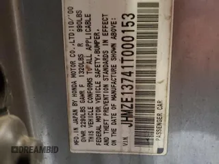 2001 Honda Insight z VIN JHMZE13741T000153, wystawiony jako Copart lot #42403595 z przebiegiem 207 491 mil mil oraz Szkoda całkowita • Salvage title. Historia ofert i sprzedaży dostępna na DreamBid. Obrazek 13.
