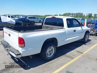 1999 Dodge Dakota SLT z VIN 1B7GL22X0XS193423, wystawiony jako IAAI lot #42053562 z przebiegiem 209 802 mil mil oraz . Historia ofert i sprzedaży dostępna na DreamBid. Obrazek 4.