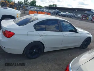 2014 BMW 3 Series 328i with VIN WBA3A5C5XEJ463938, listed as a IAAI auction lot 42103330 with 194,263 mi miles and . Bid and sale history available at DreamBid. Image 13.