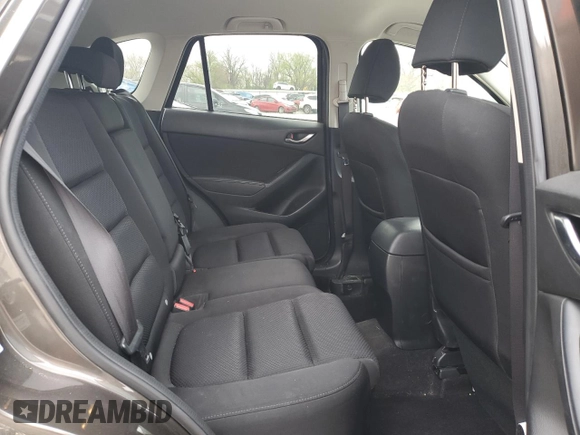2016 Mazda CX-5 Touring with VIN JM3KE2CY8G0902131, listed as a Copart auction lot 53354745 with 123,474 mi miles and Salvage Title. Bid and sale history available at carsss.com. Image 11.