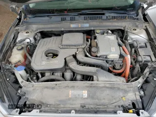 2013 Ford Fusion SE Hybrid z VIN 3FA6P0LU2DR104182, wystawiony jako Copart lot #63107545 z przebiegiem 249 317 mil mil oraz Szkoda całkowita • Salvage title. Historia ofert i sprzedaży dostępna na DreamBid. Obrazek 11.