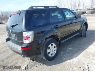 2010 Mercury Mariner with VIN 4M2CN8B79AKJ04672, listed as a IAAI auction lot 41736274 with 129,215 mi miles. Bid and sale history available at carsss.com. Image 4.